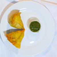 Punjabi Samosa Plate (2 Pc) · Fried pastry with filling of spiced potatoes and peas.