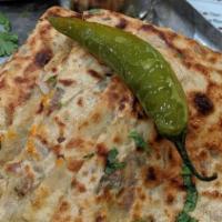 Aloo Piyaz Paratha · Thick Indian wheat flatbread with stuffing of potato and onion.