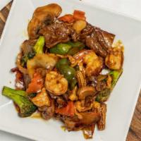 Happy Family · Beef, chicken, shrimp, scallops, and pork sliced all mixed with assorted vegetables.