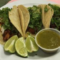Soft Shell Tacos. Of ;  · Lengua, shrimp, or al pastor with cilantro and onions lime wedges on the side any extra topp...