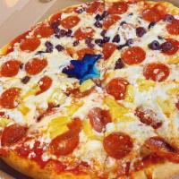 Dolcetto Pizza · Mozzarella , tomatoe sauce, pepperoni , pineapple and goat cheese.