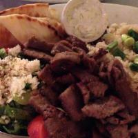 Lamb Gyro Platter · Strips of mouthwatering lamb served with Greek fries, salad, tzatziki, and pita bread.