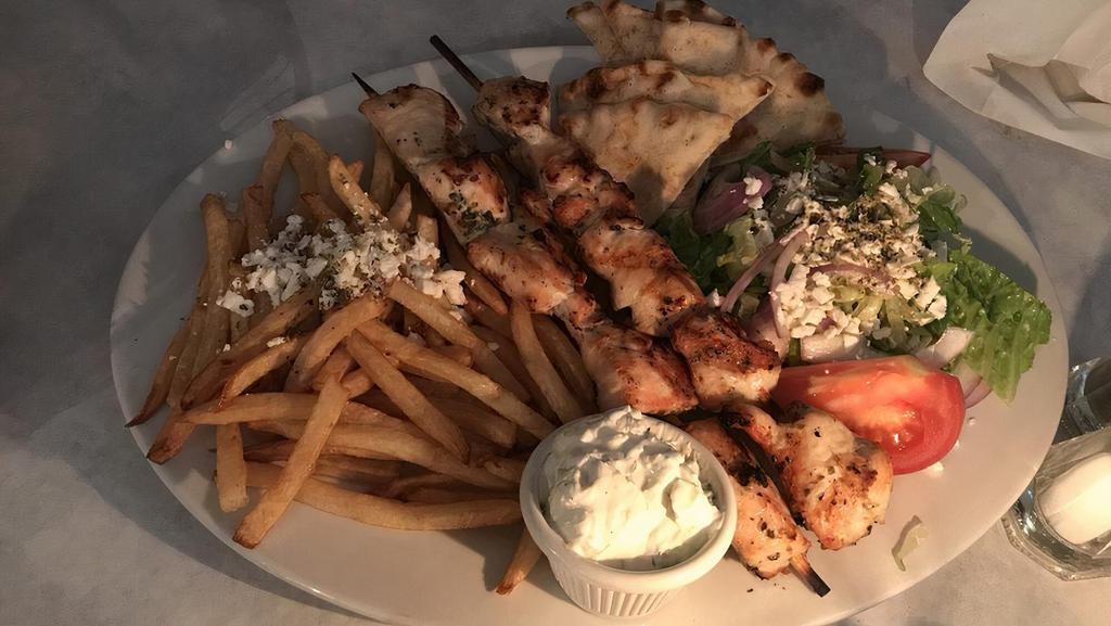 Souvlaki Combo Platter · Your choice of protein with Greek fries, salad, tzatziki, and pita bread.