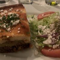Moussaka · A Greek casserole with baked eggplant, ground beef, topped with a cheese bechamel sauce and ...