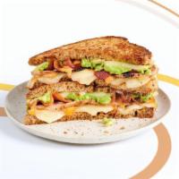 A Cut Above · Muenster cheese, roasted turkey, bacon, avocado, and Thrill Sauce on multigrain bread