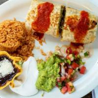Burritos Lunch · Rolled flour tortilla, melted cheese, guacamole, sour cream, pico de gallo, topped with red ...