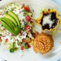Flautas Lunch · Four rolled crispy fried tortillas, stuffed with chicken, topped with sour cream, lettuce, c...
