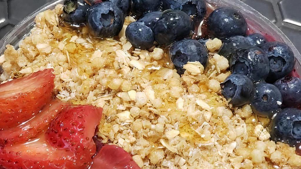 Very Berry · Pure açaí topped with granola, blueberry, strawberry, honey.