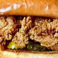 Hot Chicken Sandwich · Fried chicken, Cayenne pepper sauce, hot honey, bread and butter pickles, brioche