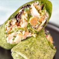 Green Goddess Shrimp Wrap · Herb grilled shrimp, baby lettuces, shaved carrot, cucumber, red onion, grape tomatoes, chic...