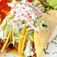 Chorizo Tacos · Spicy Mexican chorizo, corn tortilla, queso blanco, crema, avocado, radish, cilantro. Served...