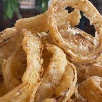 Onion Rings · Onions sliced, battered and fried to perfection. Light, crispy and delicious!