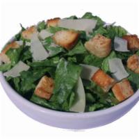 Caesar Salad · Romaine lettuce, shaved Italian cheese, coal oven baked croutons, traditional caesar dressing.