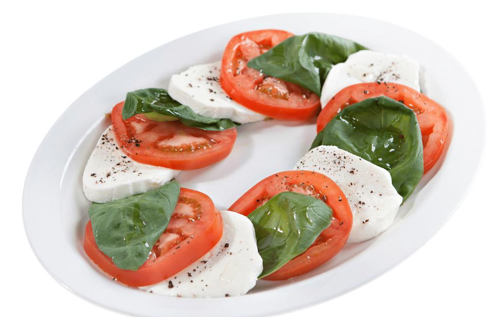Caprese · Slices of fresh mozzarella, tomatoes and fresh basil, drizzled with extra virgin olive oil.