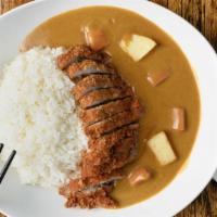 Chicken Katsu Curry · Fried chicken cutlet served with carrots, onions, and potatoes in curry.