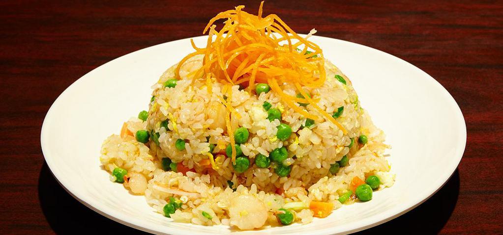 Seafood Fried Rice · Shrimp, squid, crabmeat, carrots, green peas, onions and scallions.