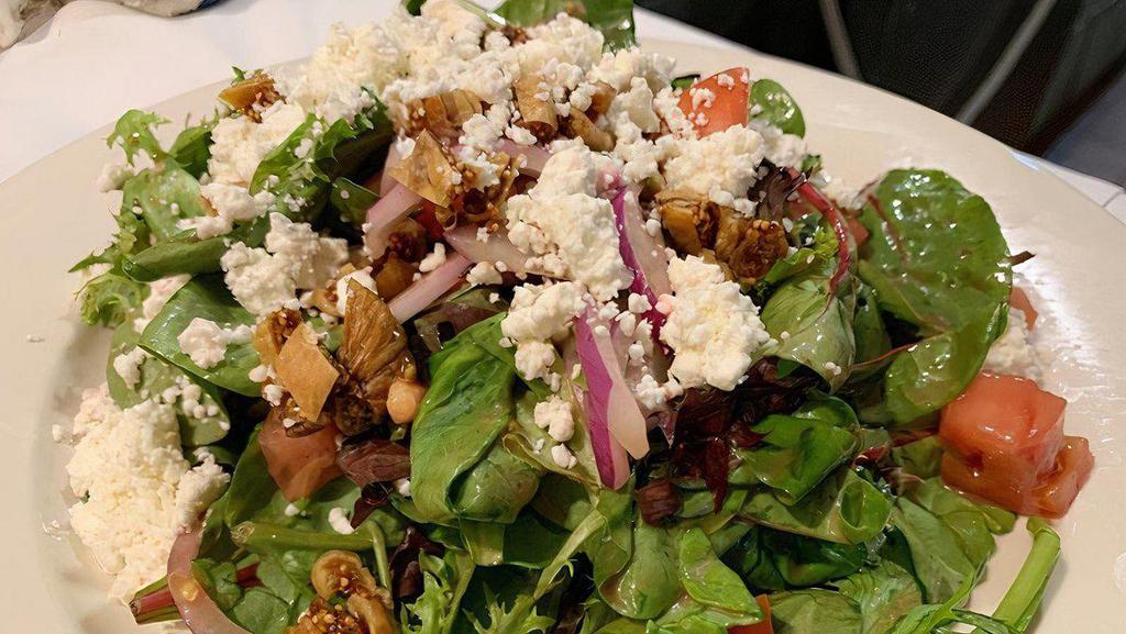 Goat Cheese Salad · Gluten-free. Mixed greens, tomatoes, figs, toasted almonds, red onions and pomegranate vinaigrette.