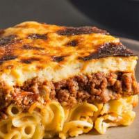 Pastitsio · Baked macaroni with seasoned ground beef and bechamel sauce.
