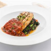 Xifias · Gluten-free. Grilled swordfish, beluga lentils, roasted red peppers, spinach, tomatoes caper...