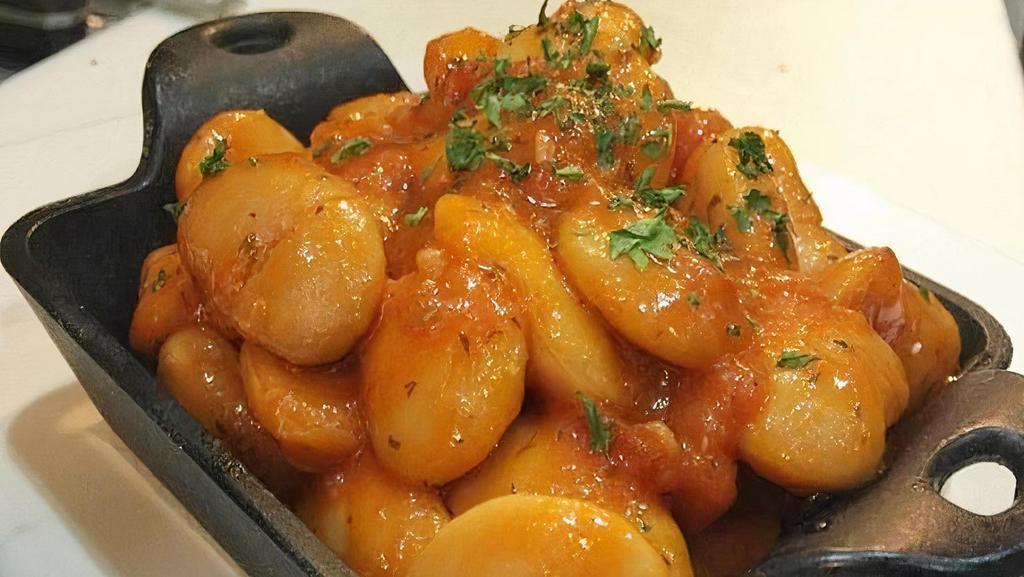Gigantes · Gluten-free. Giant lima beans, baked with tomatoes and fresh herbs.