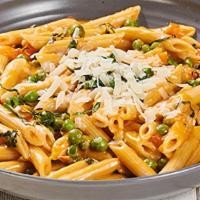 Penne Alla Vodka · Penne pasta and local peas in a tomato vodka sauce, topped with Parmesan.