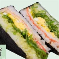 Japanese Riceball · Seaweed salad, sliced boiled egg, crab meat, and drizzled with sweet mayo. Contains sesame s...