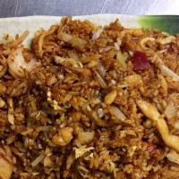 Yong Chow Fried Rice · With chicken, roast pork and shrimp.