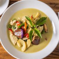 Green Curry · Spicy. Gluten-free. Bamboo shoot, eggplant, basil, bell pepper, coconut milk, long hot chili.