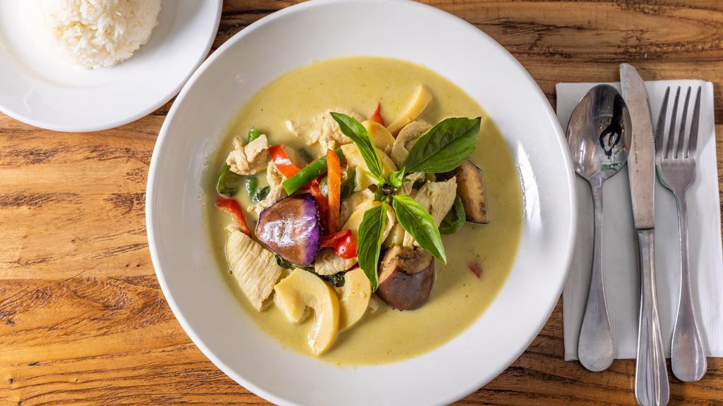 Green Curry · Spicy. Gluten-free. Bamboo shoot, eggplant, basil, bell pepper, coconut milk, long hot chili.
