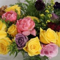 Vivid Memories Of Love · Delight your mother with this vibrant arrangement of coral peonies, large yellow and violet ...