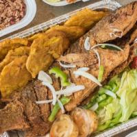 Fried Red Snapper (3/4 Lb) · 3/4 lb fresh red snapper. salad and plantain included. choice of rice