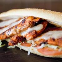 Grilled Chicken Sandwich · Grilled Chicken, lettuce, tomato, mayo and mozzarella.