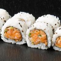 Spicy Salmon Roll · 8pc inside out roll with cucumber and avocado.