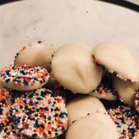 White Chocolate Nonpareils · Top seller! These sweet white chocolate nonpareils are coated in a rainbow of beautiful mult...