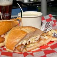 Lunch Combo (Soup And Sandwich) · New England Clam Chowder w/Fried Shrimp Po'Boy, Sliced Cucumber & Tarragon Mayo topped with ...