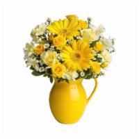 Teleflora'S Sunny Day Pitcher Of Cheer · This bouquet is just bright for any occasion! A bright and sunny medley of flowers is hand-d...