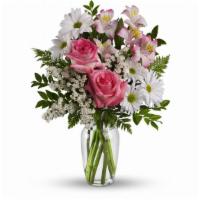 What A Treat Bouquet With Roses · This lovely bouquet of pink roses, pink alstroemeria, and white mums in a sparkling clear gl...