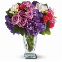 Teleflora'S Rhapsody In Purple · A rhapsody of beauty is on stunning display in this arrangement. Gorgeous blossoms are beaut...