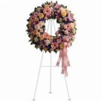 Graceful Wreath By Teleflora · Family and friends will recollect how special their loved one was with this gentle and timel...