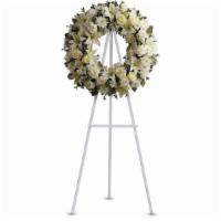 Serenity Wreath By Teleflora · A ring of fragrant, bright white blossoms will create a serene display at any funeral or wak...