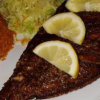 Red Snapper · One whole red snapper fish seasoned, pan-seared, slow baked in an air-dry-heat oven, then se...