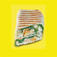 The Chicken Caesar Wrap · Grilled chicken, parmesan cheese, croutons, spinach with Light Caesar in a flour tortilla