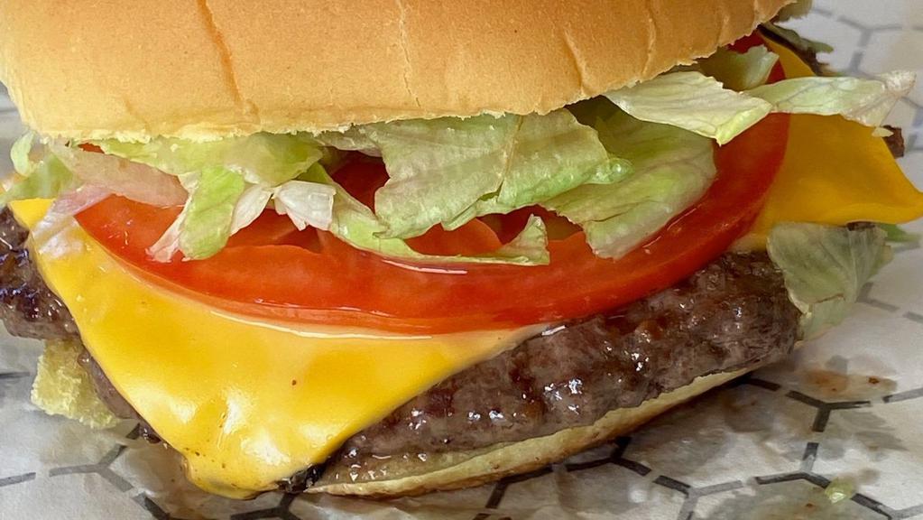 Moo Cheeseburger · With/ Lettuce, Tomato, Pickle and American cheese. 
 Swiss (extra charge) or Cheddar (extra charge)