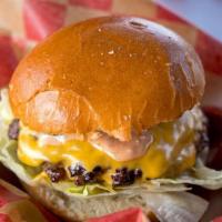 Double Moo Cheeseburger · Two patties With/ Lettuce, Tomato, Pickle and double American cheese. 
Swiss and Cheddar Che...