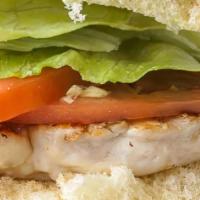 Grilled Chicken Sandwich · Topped with lettuce, tomato, and mayo on a brioche roll