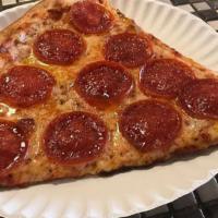 Pepperoni Pizza Slice · Classic cheese and pepperoni.