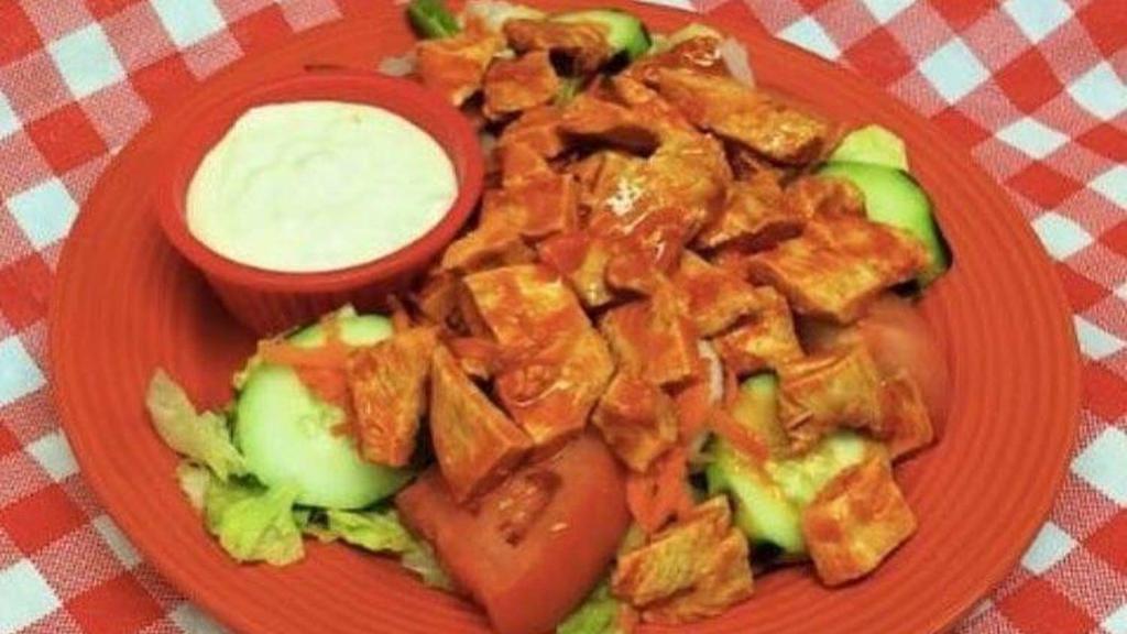 Buffalo Chicken Salad · Comes with lettuce, tomatoes, onions, cucumbers, green peppers, and buffalo chicken.