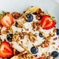 Greek Yogurt Bowl · Greek yogurt, granola, berries and honey.