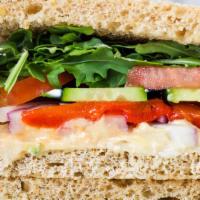 Mediterranean Ciabatta Sandwich · Hummus, tomato, avocado, cucumber, onion, and feta cheese & basil aioli dressing