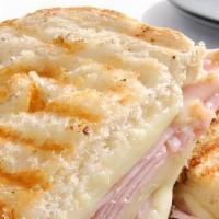 Ham And Swiss Cheese Panini · Sliced ham and swiss cheese on a grilled panini